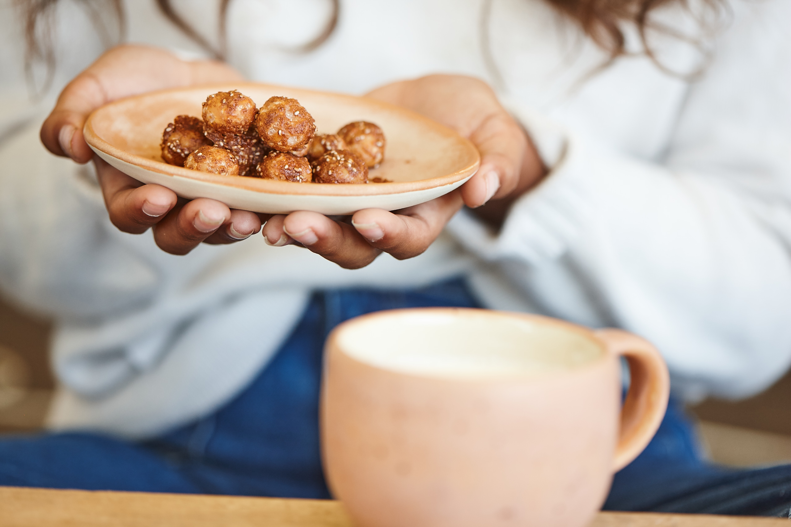 Warm spice-infused macadamia milk with spiced macadamias