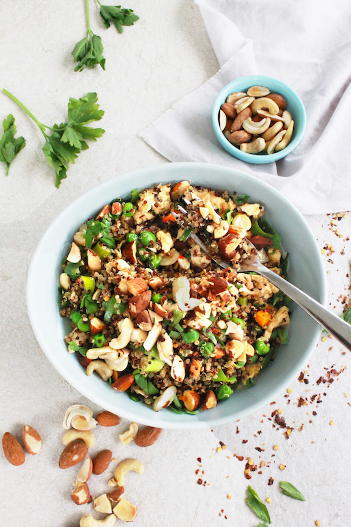 Quinoa ‘fried rice’ with almonds and cashews