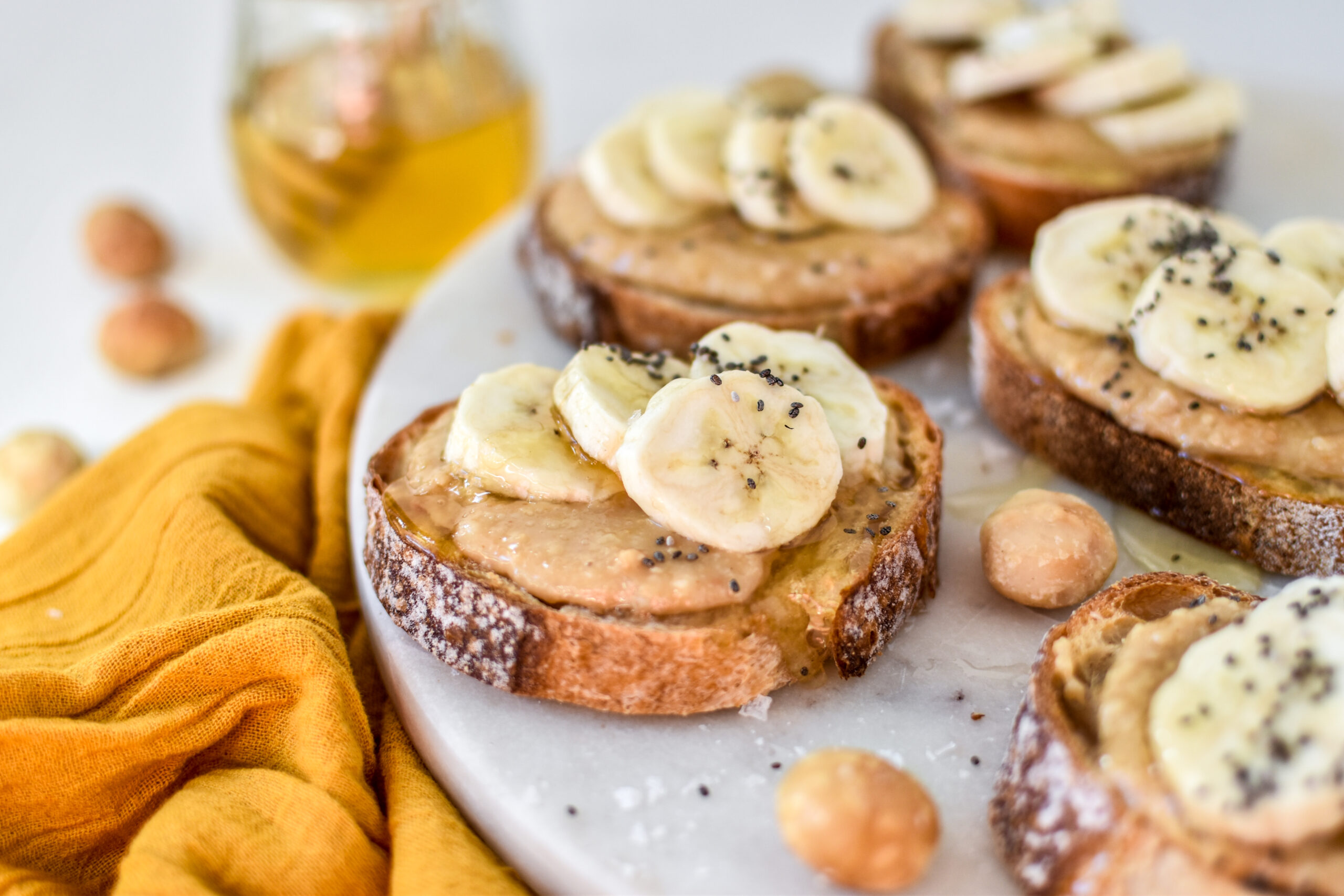 Salted macadamia butter, banana and honey crostinis recipe